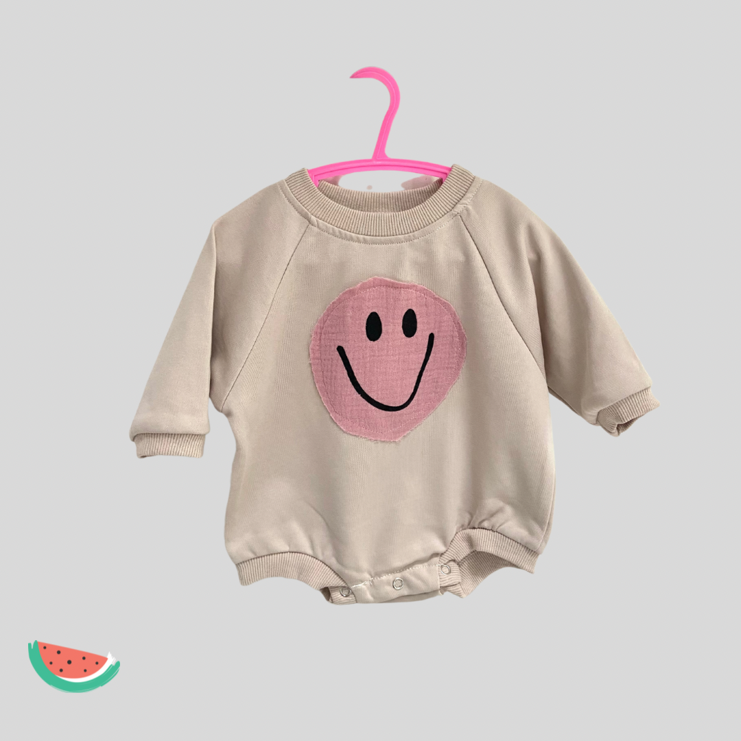 Waffle print smiley face babygrow